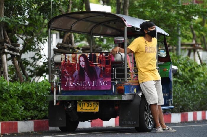 K-pop fans help tuk-tuk drivers during the pandemic.