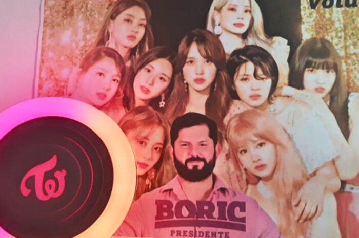 ‘Hand heart’ holding a photo card Are K-Pop Fans the Leading Role in the Presidential Election?