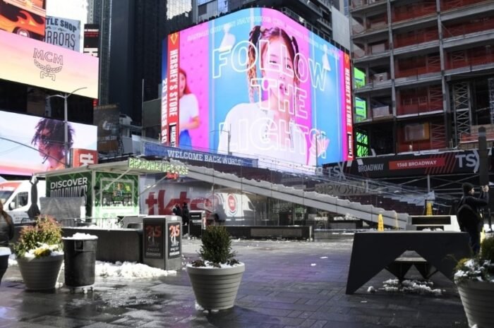 ‘Hot Rookie’ Omega X X Be X Right Some take over the large electronic display in Times Square, USA.
